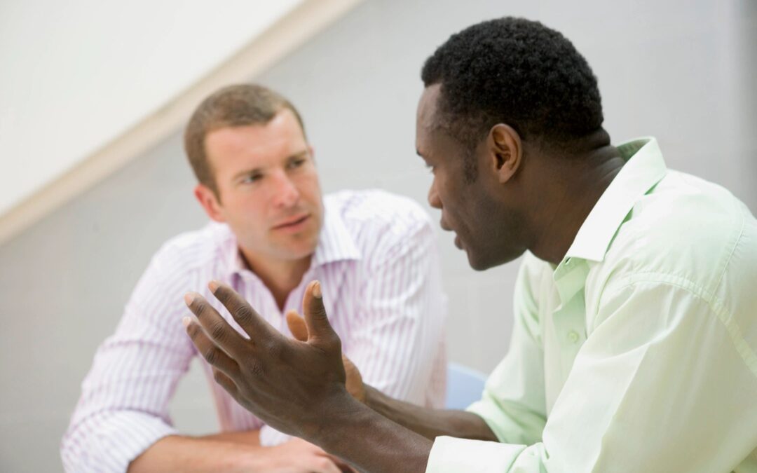Two men talking
