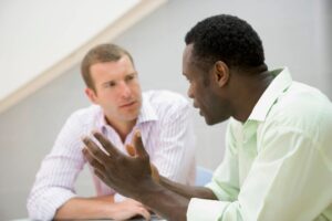 Two men talking