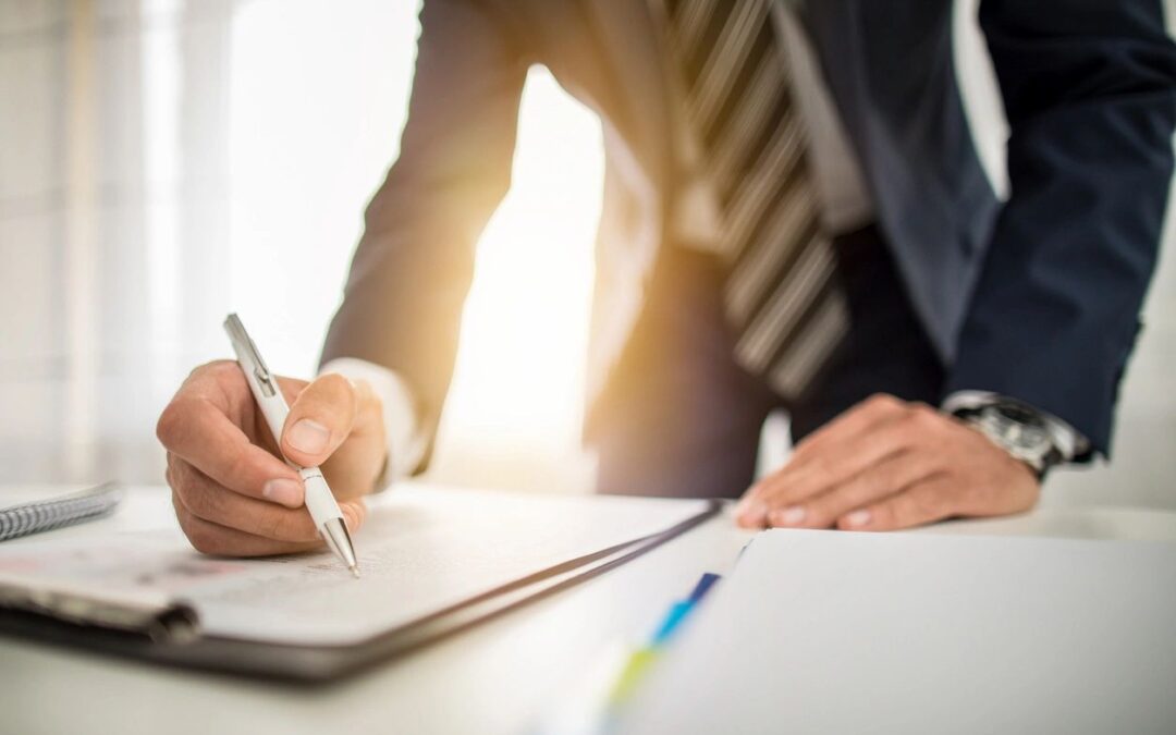 Man writing on paper